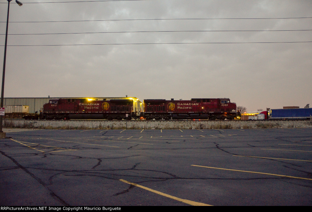 CP AC44CW Locomotives leading a train